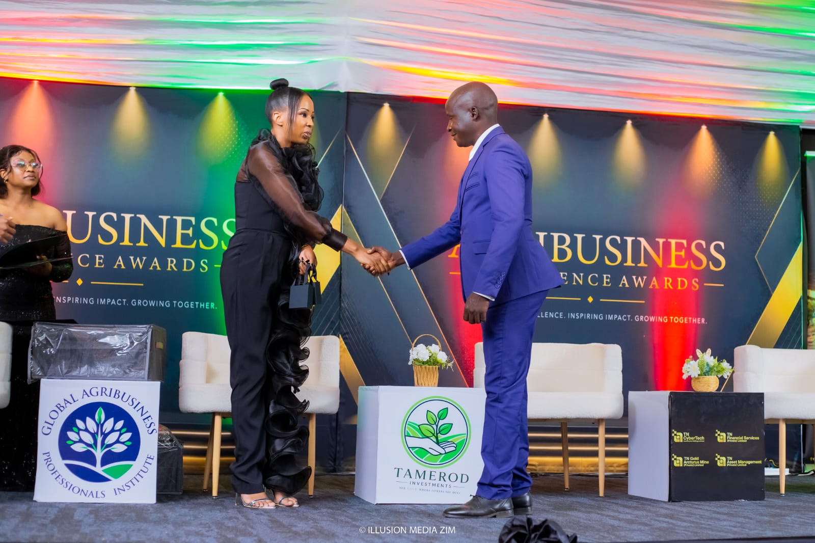 Agribusiness Excellence Awards handshake on stage