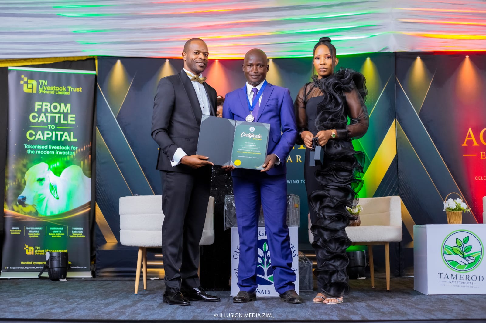 Receiving certificate at Agribusiness Excellence Awards