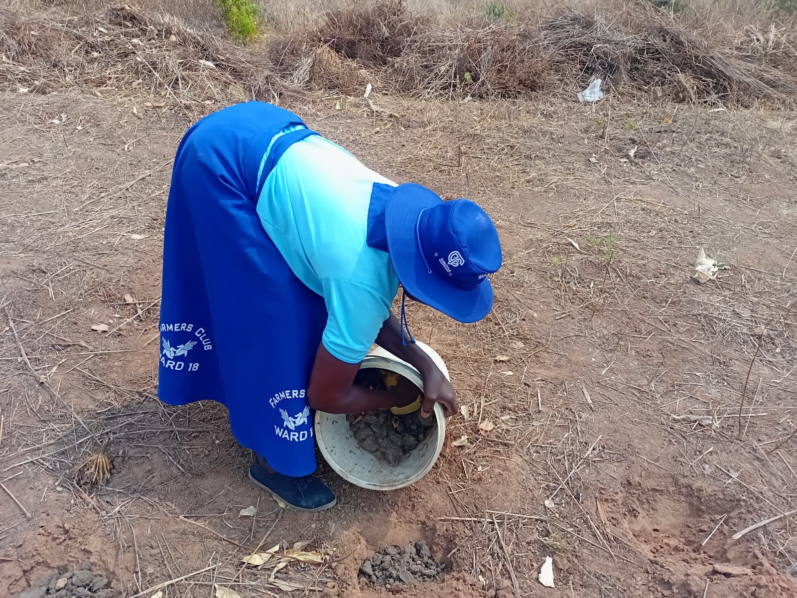 Farmers working the soil